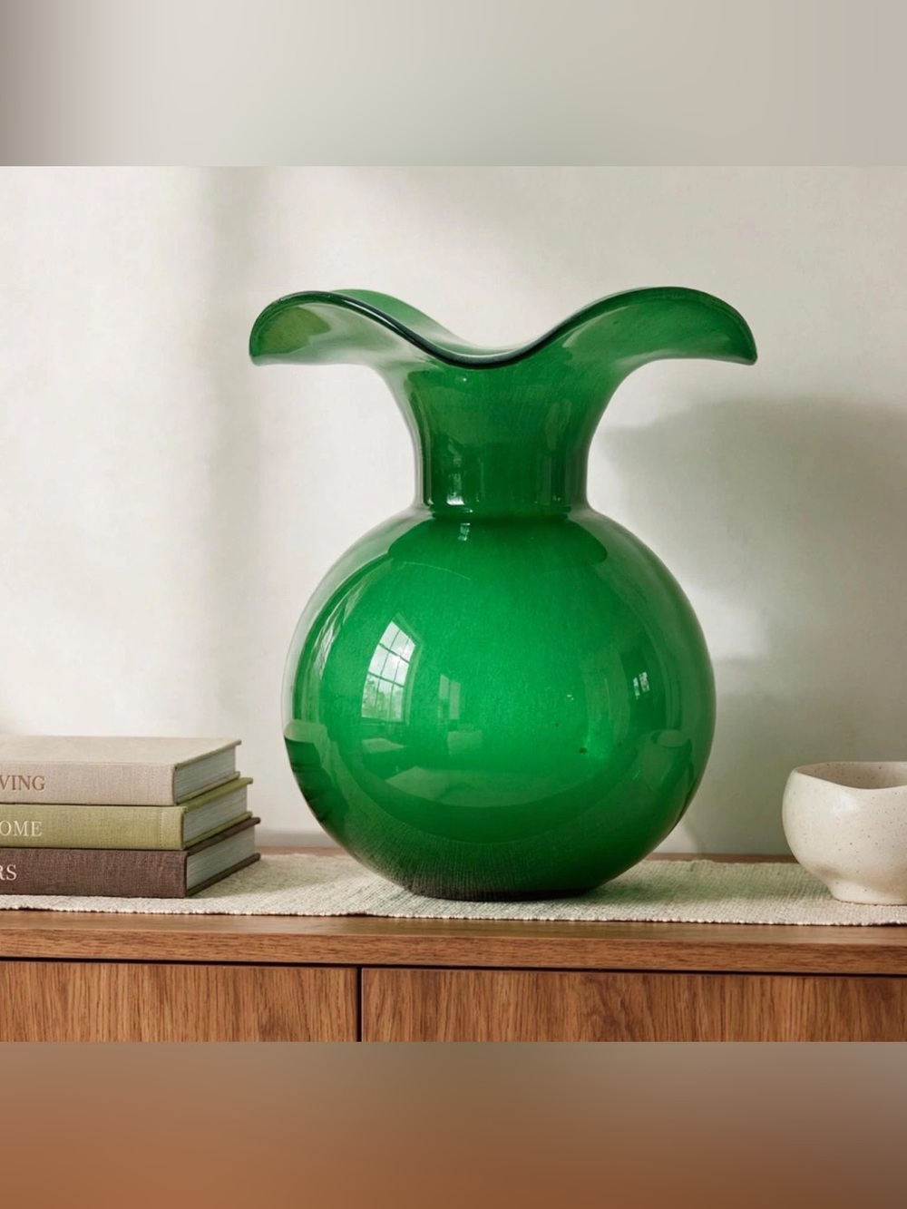 Elegant Hibiscus Fluted Vase in green glass.